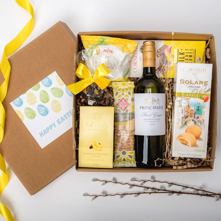 Wielkanocny zestaw w brązowym pudełku kraft z butelką wina, czekoladami i herbatą