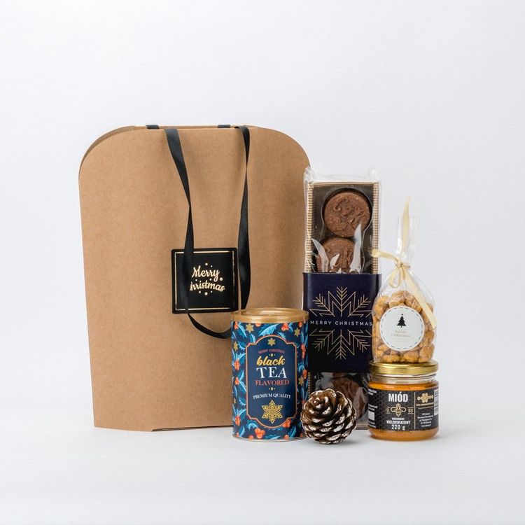 Świąteczna torba papierowa kraft z uchwytami sznurkowymi, ciastka czekoladowe, herbata, orzechy i miód